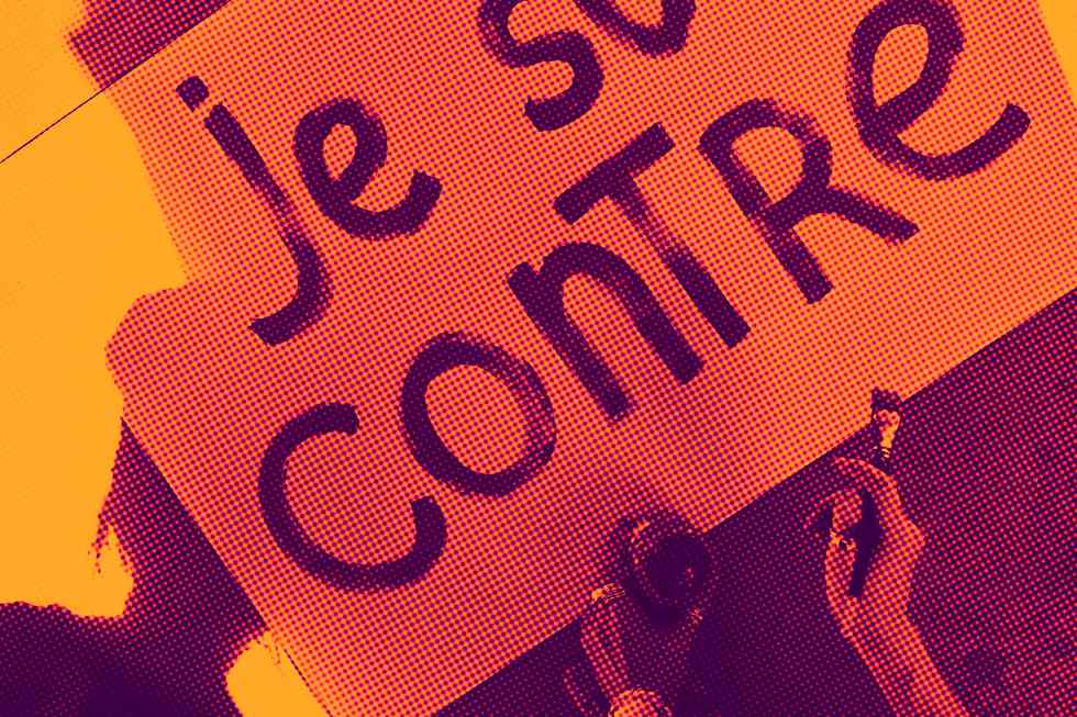 Placa com a frase "Sou Contra" em francês